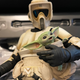 A 12-inch Scout Trooper action figure hugs a tiny Baby Yoda figure.